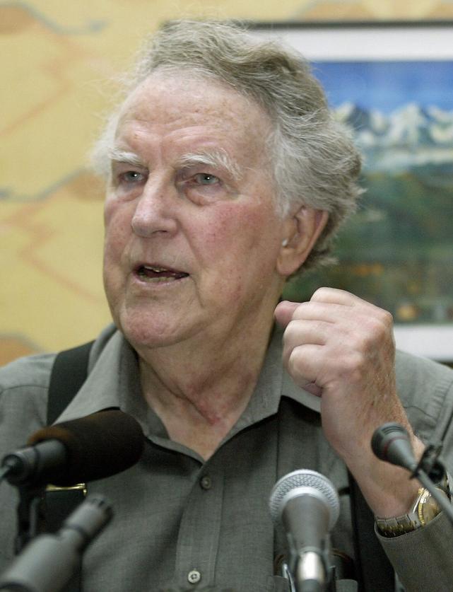 Sir Edmund Hillary gestures as he answer